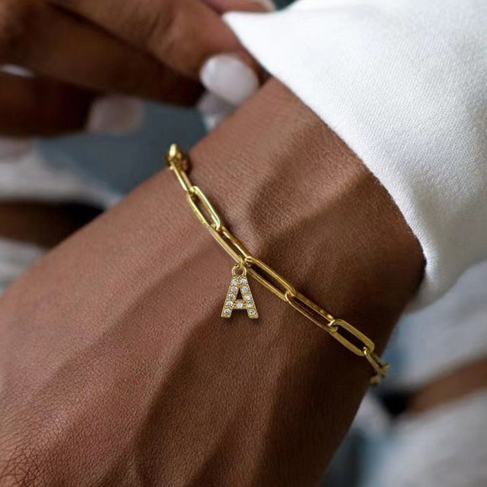 Bracciale lettera oro