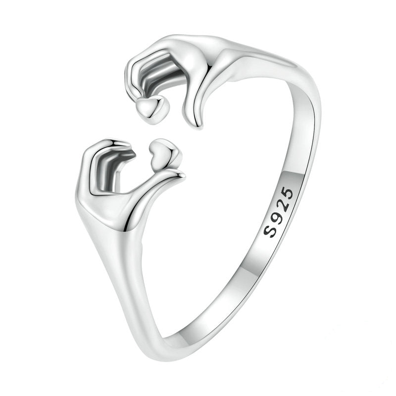Anello mani che formano cuore