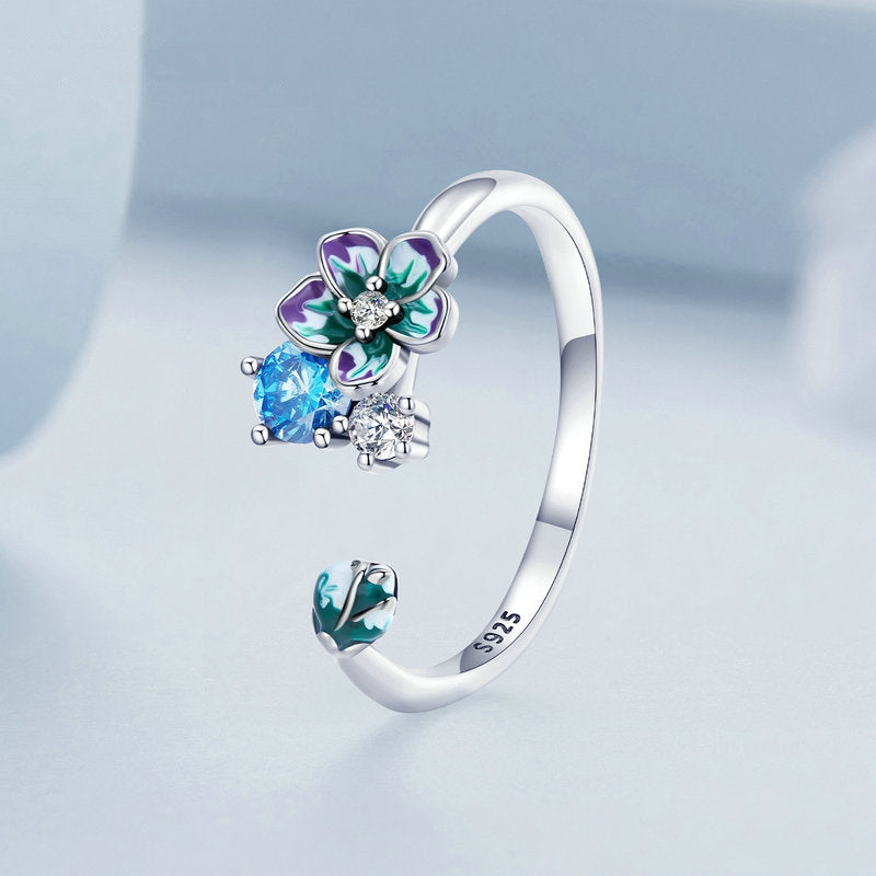 Anello fiore e cristalli