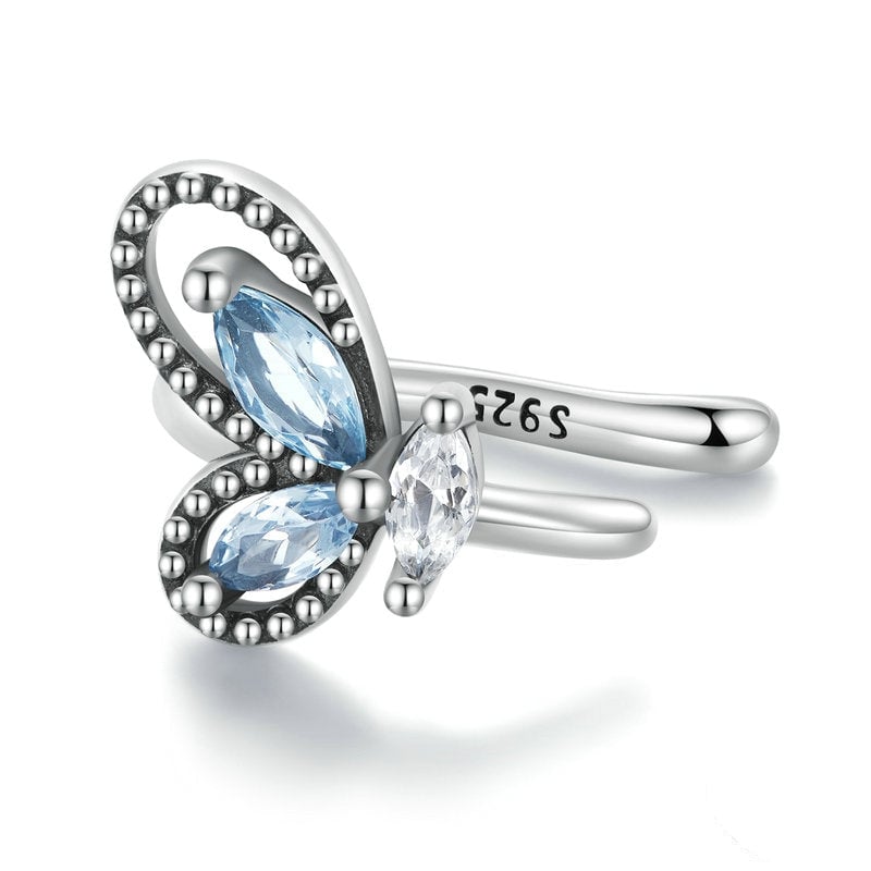 Ear Cuff Farfalla <titolo_esteso><span>Argento 925 placcato oro bianco con zirconi azzurri e bianco</span></titolo_esteso>